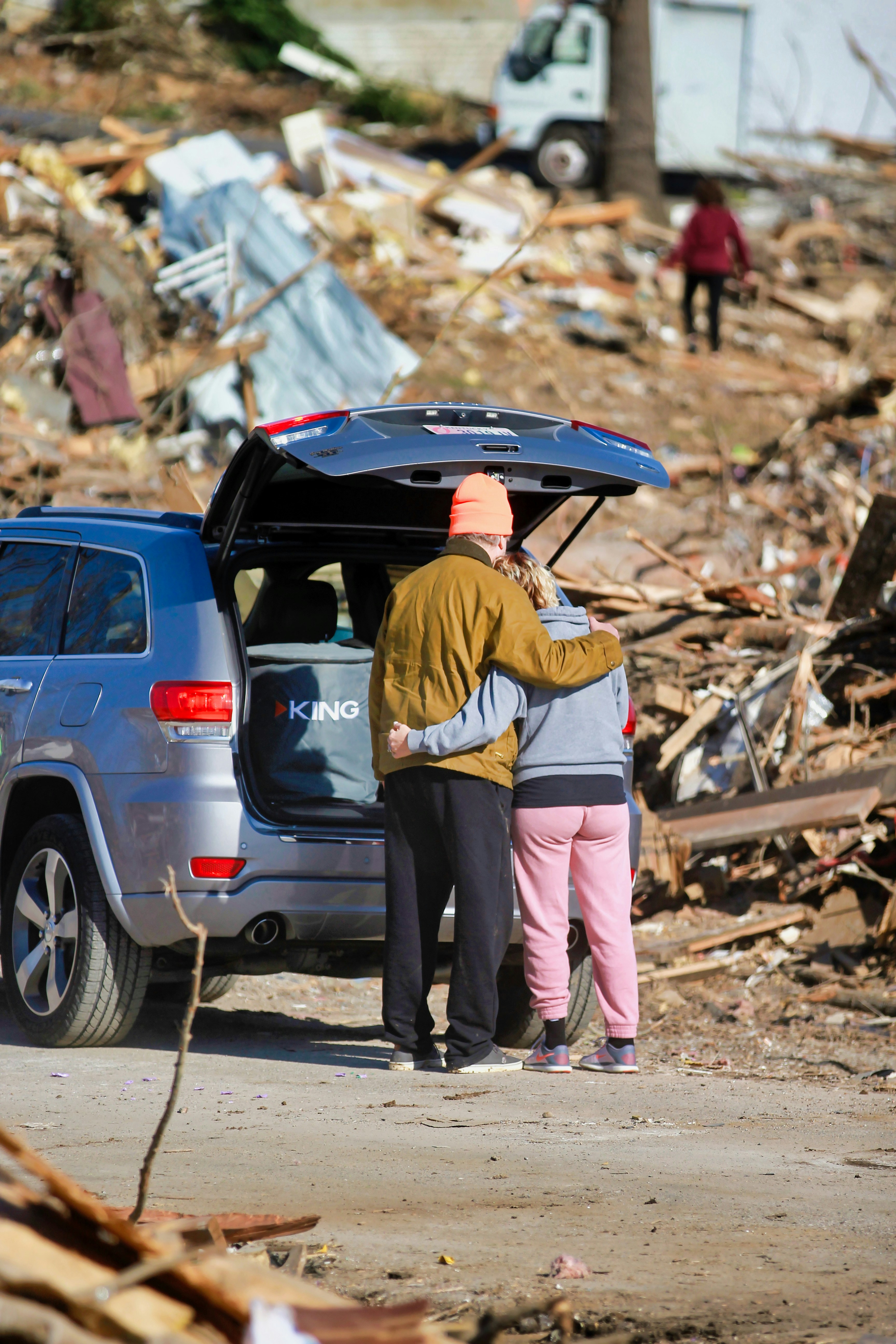 Survivors in disaster aftermath — photo by Chandler Cruttenden